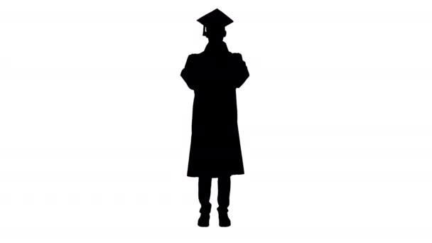 Silhouette Young man with graduation gown in medical mask. — Stock Video