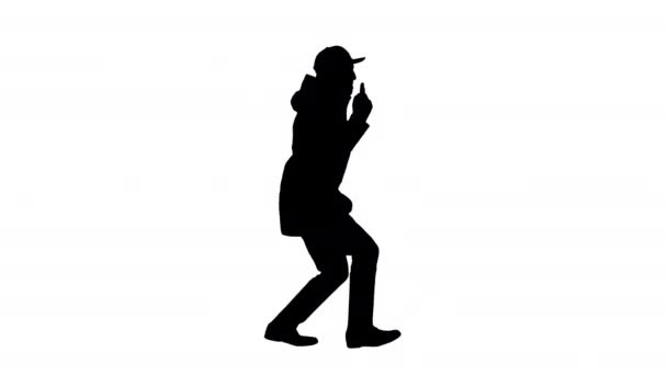Silhouette Hip-hop άνθρωπος τραγουδώντας ραπ, το περπάτημα και κάνοντας χειρονομίες. — Αρχείο Βίντεο