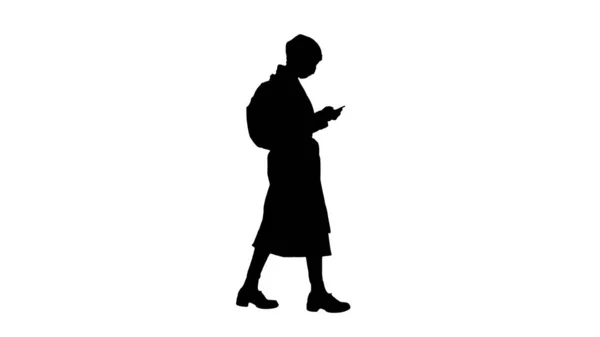 Silhouette Female wearing medical mask walking. — Stock Photo, Image