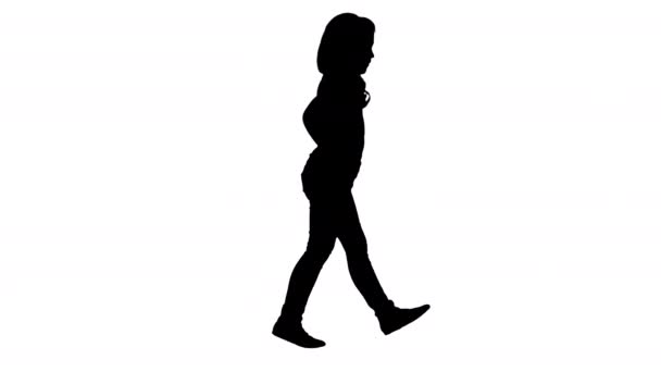 Sylwetka Mała dziewczynka w ubraniach casual walking. — Wideo stockowe