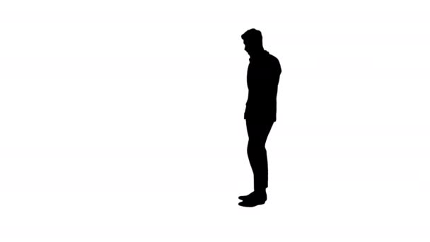 Silhouette Inspirado hombre en formal recibiendo buenas noticias por teléfono y bailando después . — Vídeos de Stock