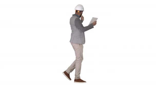 The hipster engineer making video call with tablet showing result of his work on white background. — Stock Video