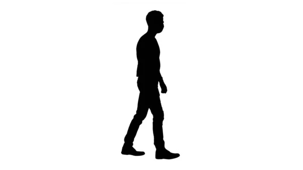 Silhouette Giovane bell'uomo che cammina con maschera medica su . — Foto Stock
