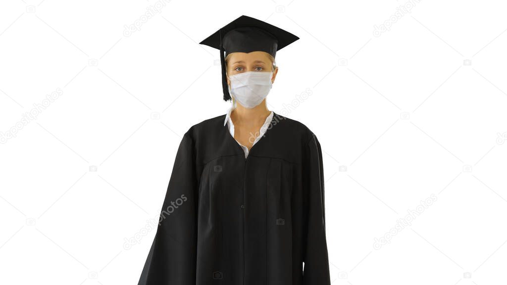 Female Graduate in Cap and Gown Wearing Medical Mask Walking on white background.