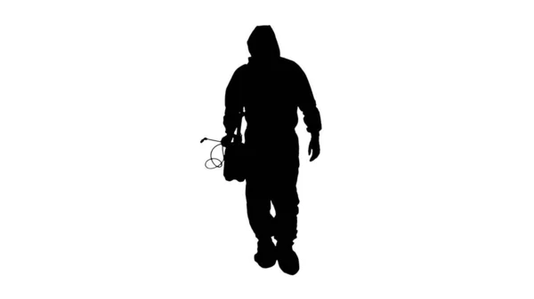 Silhouette Virologist in protective uniform walking and disinfecting the area. — Stock Photo, Image