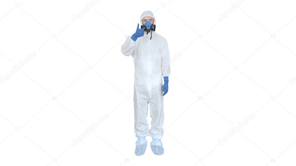 Man in protective suit, a mask and a respirator Thumbs up on white background.