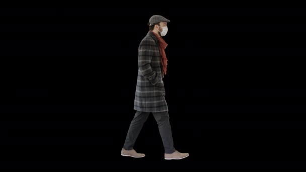 Gentiluomo che indossa una maschera protettiva camminando, Alpha Channel — Video Stock