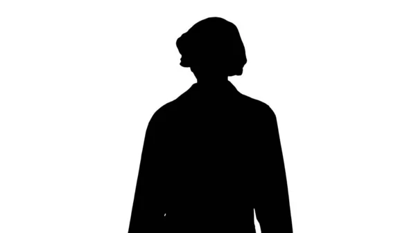 Silhouette Walking Ärztin mit chirurgischer Maske. — Stockfoto