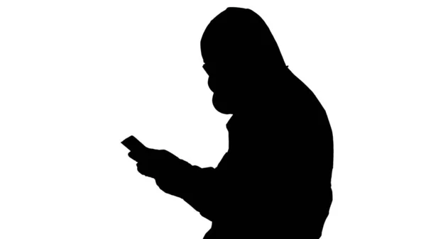 Silhouette-Arzt im Schutzanzug mit digitalem Tablet, Covid-19-Konzept. — Stockfoto