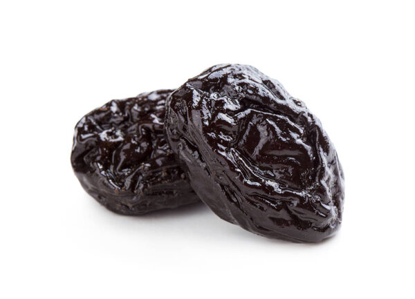 Two prunes on white background