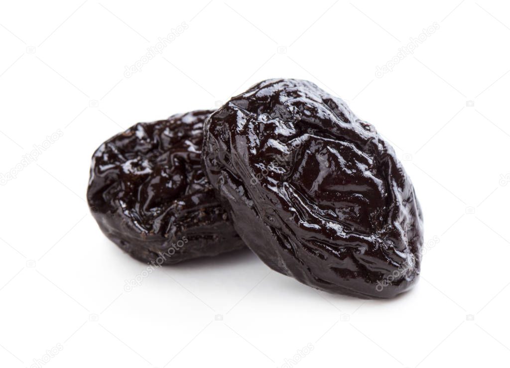 Two prunes on white background