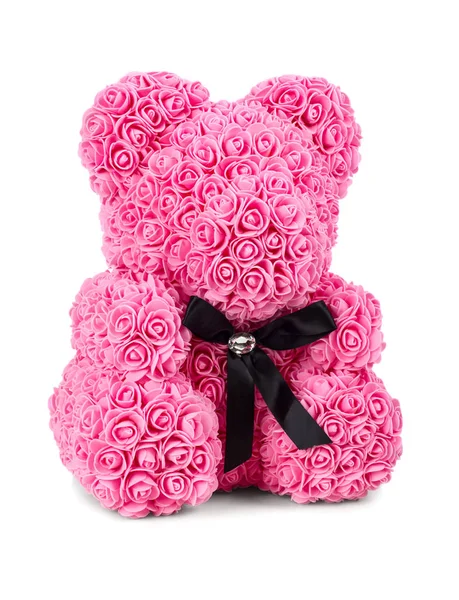 Speelgoedteddybeer gemaakt van fron roze rozen — Stockfoto