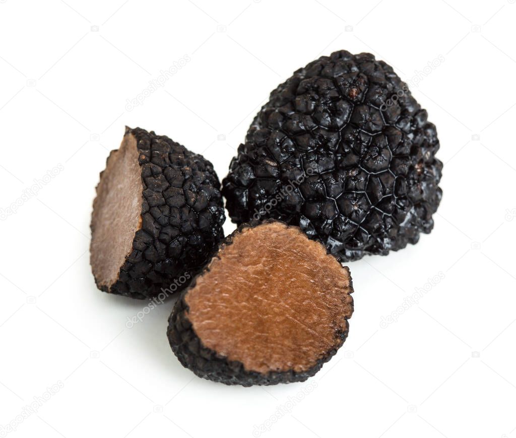Black gourmet truffle mushroom isolated on white background