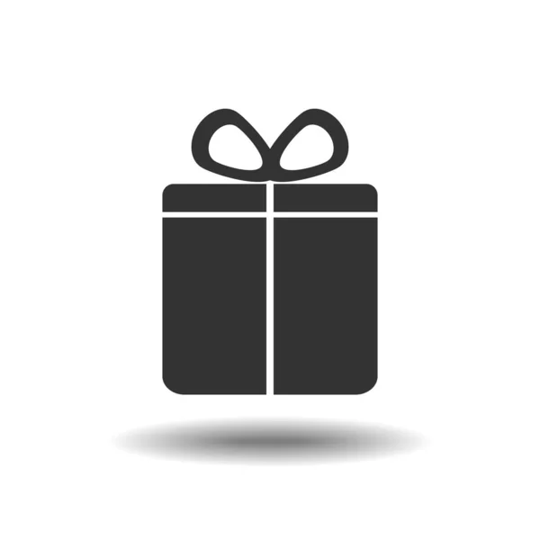 Подарункова коробка. Іконка подарунка. Чорний подарунковий символ на білому тлі . — стоковий вектор
