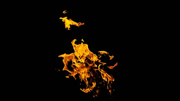 Llamas de fuego sobre fondo negro. fuego sobre fondo negro isolat —  Fotos de Stock