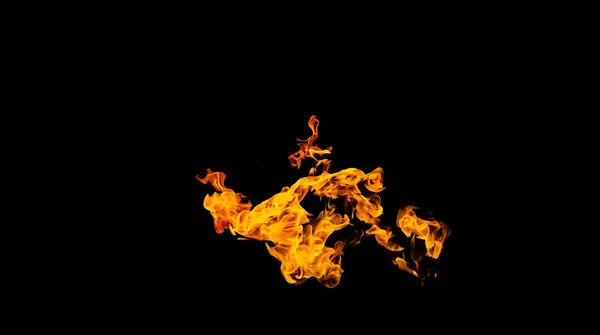 Llamas de fuego sobre fondo negro. fuego sobre fondo negro isolat — Foto de Stock