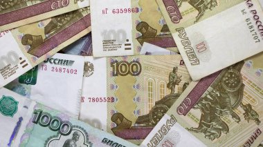 Kağıt paralar Rus Rublesi. Rubles, Rusya 'nın ulusal para birimidir. Rusya Bankası. Rus Rublesi. Bin ruble yakın plan. Rublonun düşmesi ya da yükselmesi.