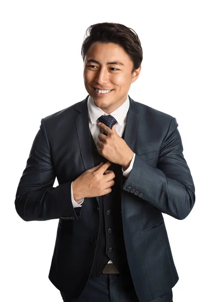 Pohledný podnikatel v modrém obleku a kravatě — Stock fotografie