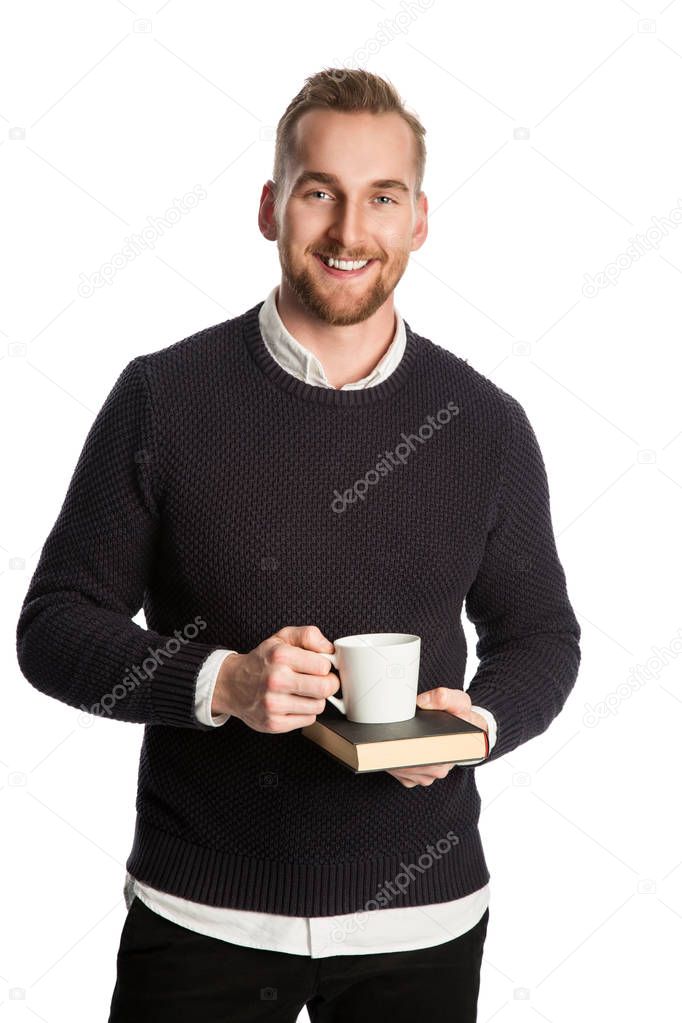 Handsome man reading a book