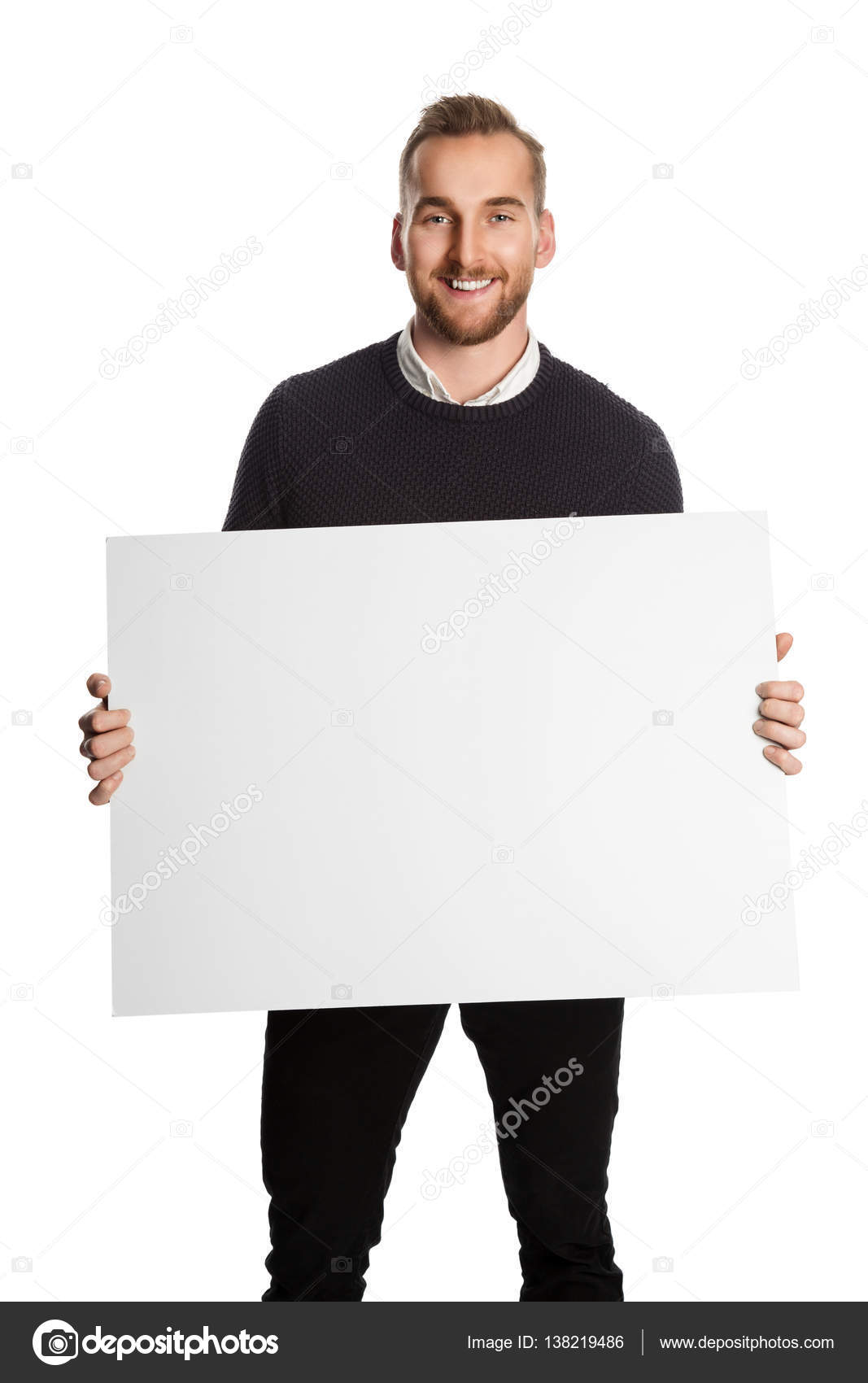Man showing blank white big A2 paper. Leaflet presentation. Pamp Stock  Photo by ©onlyblacktv.bk.ru 146432985