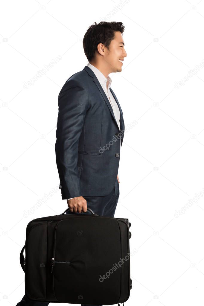 Smiling traveling businessman