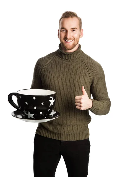 Glücklicher Mann mit großer Tasse — Stockfoto