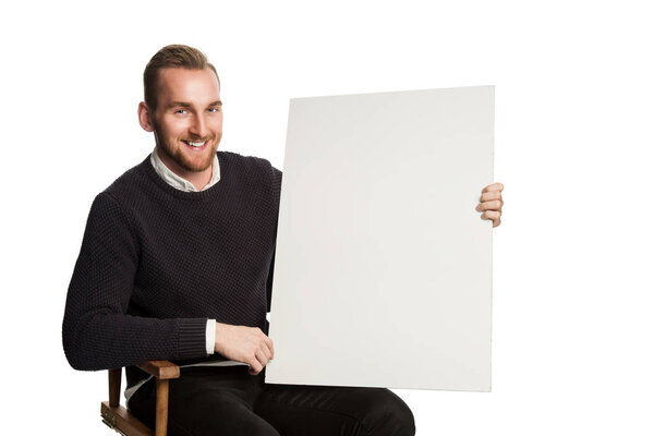Man holding a blank cardboard