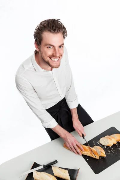 Home chef with freshly baked bread — Stock Photo, Image