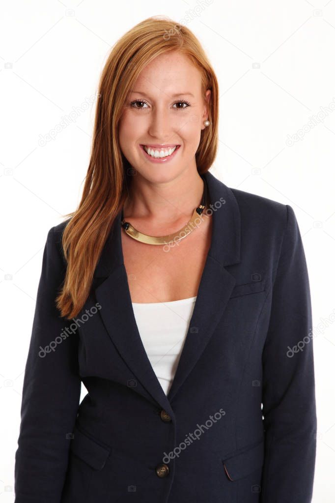 Red haired businesswoman in blue suit smiling