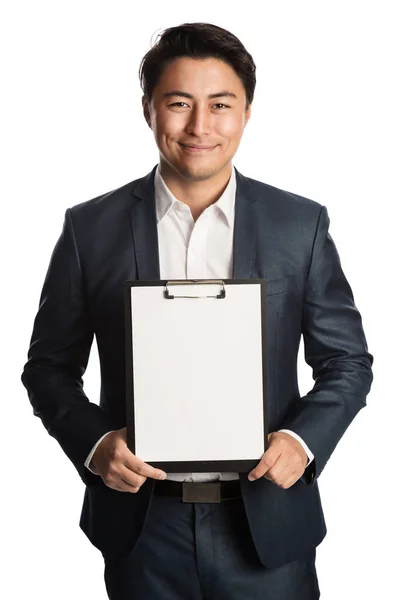 Handsome businessman in blue suit with clipboard — Stock Photo, Image