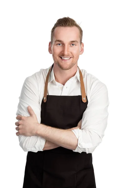 Bom chef olhando em avental preto — Fotografia de Stock