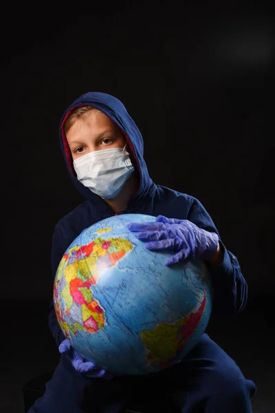 Boy Holds Globe His Hands Protect Medicine Mask — Stock Photo, Image