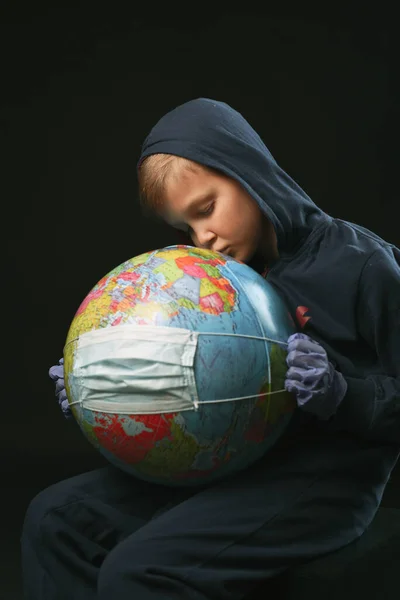 Boy Holds Globe His Hands Protect Medicine Mask — Stock Photo, Image