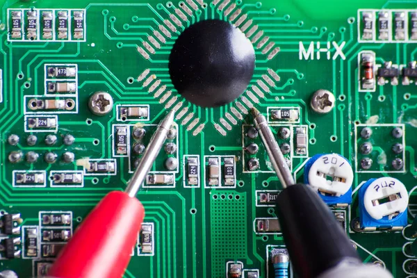 Measuring a processor board for repair — Stock Photo, Image