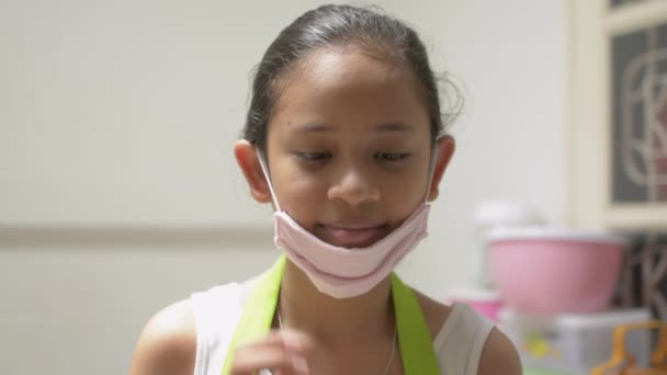 Portrait Cute Apron Wearing Protective Mask Drinking Milk Quarantine Protect — Stock Video