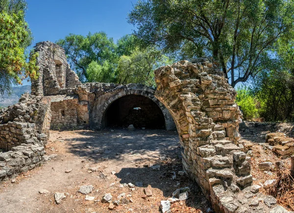 Impressions of the Ancient town Butrint (Buthrotum) - touristic attraction in Albania. Summertime traveling. Amazing original old town with fantastic stone architecture.