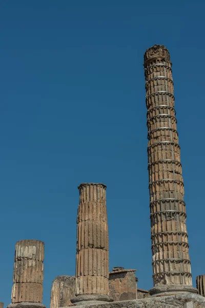 Antique square with columns in Pompeii, Italy, . Ancient ruians monochrome. Pompeii disaster concept. Pompeii landmark. Antique roman and italian architecture