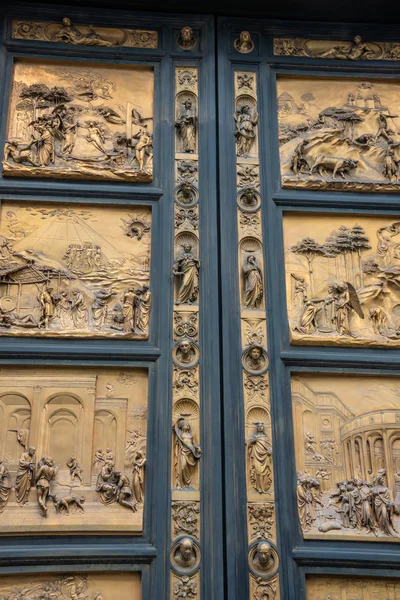 Gates of Paradise with Bible stories on door of Duomo Baptistry in Florence, Italy. Architecture and landmarks of Florence
