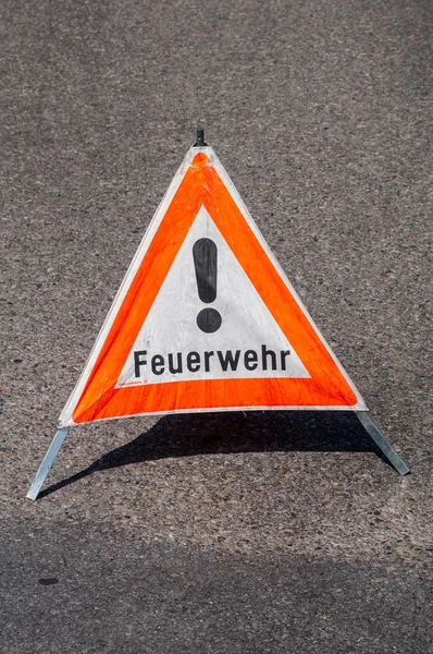Road blocked by fire department. Warning sign with the German word Feuerwehr (in English fire brigade)
