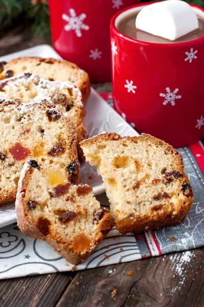 Holidays cake with raisins  and hot chocolate mug — Stock Photo, Image