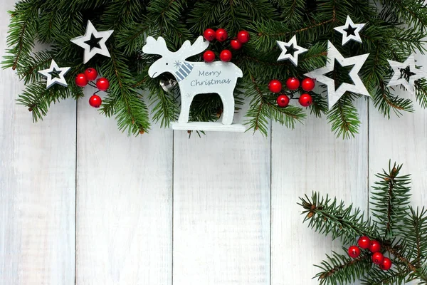 Christmas decoration over wooden background — Stock Photo, Image