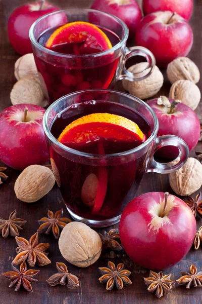 Glass with mulled wine and spices — Stock Photo, Image