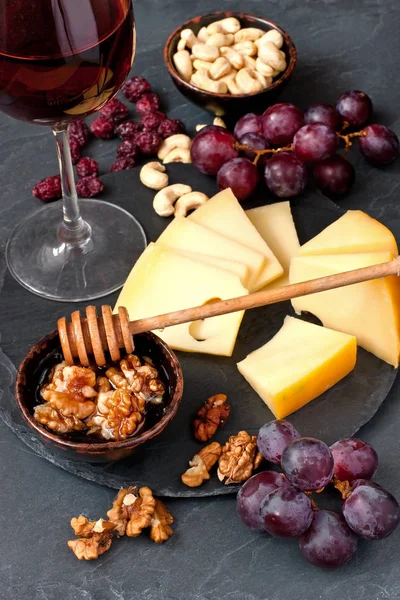 Cheese, grape and wine glass — Stock Photo, Image