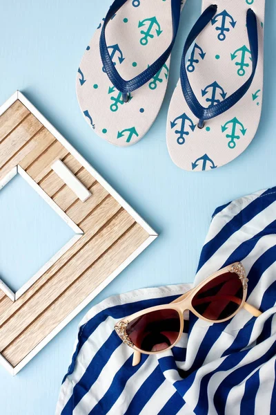 Beach items with  sunglasses  on wooden background — Stock Photo, Image