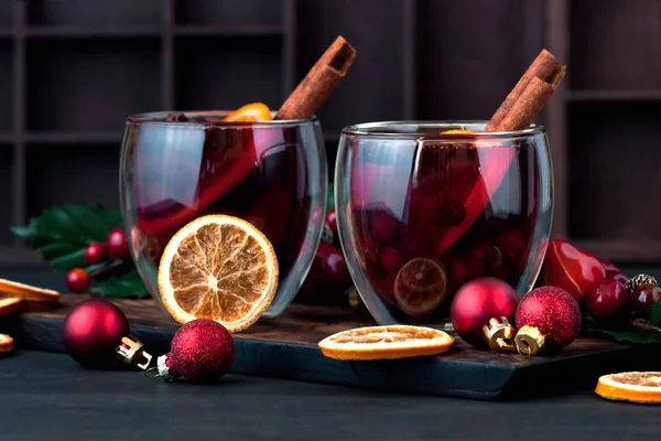 Glass with mulled wine and spices — Stock Photo, Image