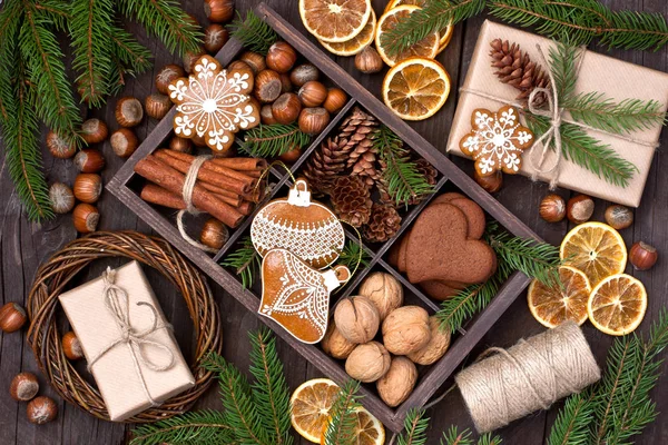 Christmas food background. Fruits, cookies, spices and nuts. Top — Stock Photo, Image