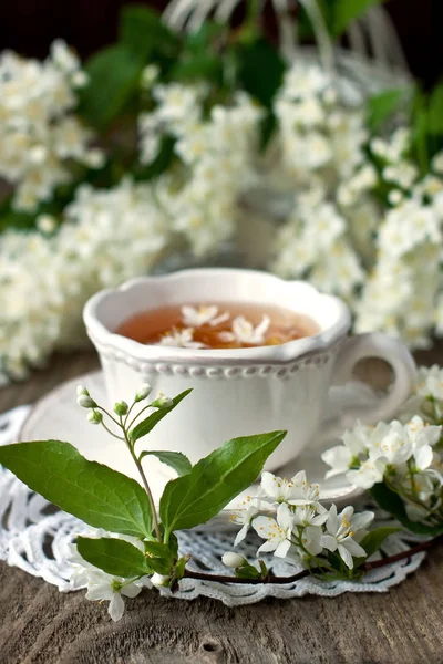 Flores Jazmín Taza Sobre Fondo Rústico —  Fotos de Stock