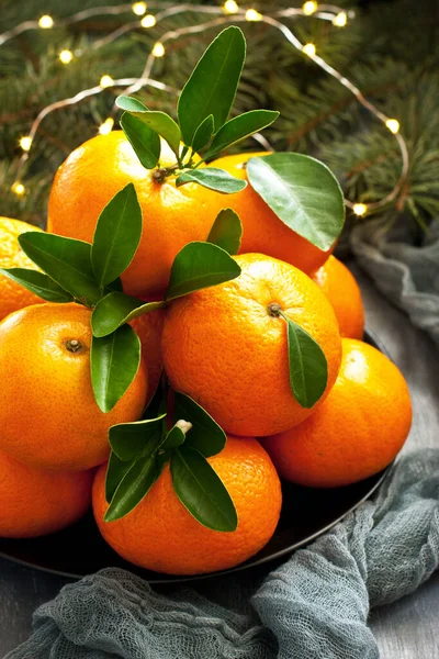 Christmas Fruits Mandarins Lights Plate Selective Focus Shallow Depth Field — Stock Photo, Image