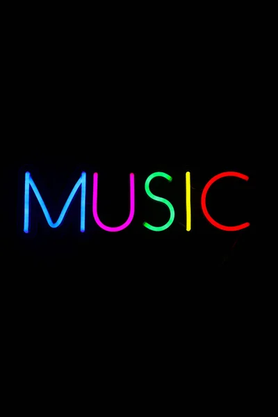 Multicolored music sign on isolated black background. — 스톡 사진