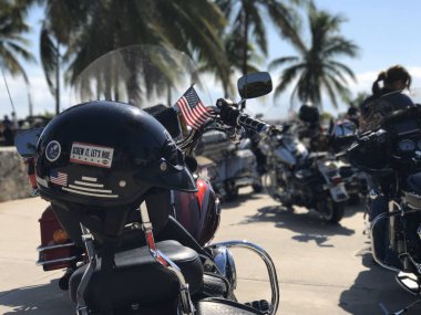 Miami Beach, USA - NOV 16 2017: Screw It, Lets ride helmet sticker on a Harley Davidson bikers meeting day clipart
